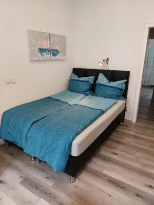 Ein Bett oder Betten in einem Zimmer der Unterkunft City Apartment in Velbert-Mitte