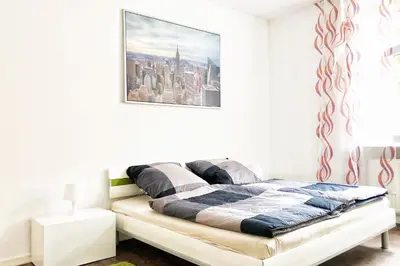 Ein Bett oder Betten in einem Zimmer der Unterkunft Wunderschöne Altbauwohnung mit Flair in Wuppertal