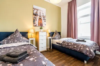 Ein Bett oder Betten in einem Zimmer der Unterkunft Adora Apartment Hilden