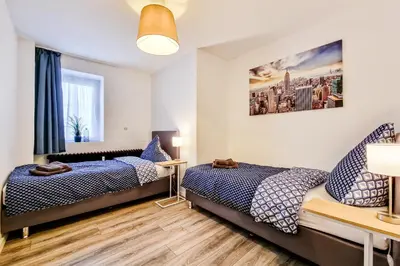 Ein Bett oder Betten in einem Zimmer der Unterkunft Adora Apartment Hilden