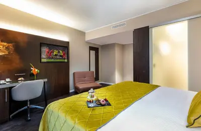 Ein Bett oder Betten in einem Zimmer der Unterkunft Leonardo Hotel Dortmund