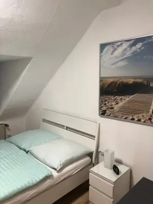 Ein Bett oder Betten in einem Zimmer der Unterkunft Wohnen auf Zeit