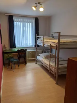 Ein Bett oder Betten in einem Zimmer der Unterkunft Ruhrtropolis Hostel