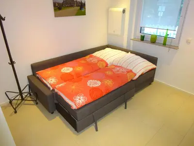 Ein Bett oder Betten in einem Zimmer der Unterkunft 2-Zimmer-Ferienwohnung im Herzen von Nordkirchen