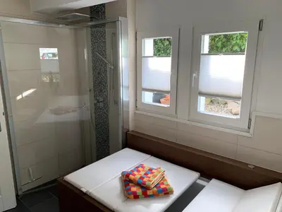 Ein Badezimmer in der Unterkunft Buxhaus
