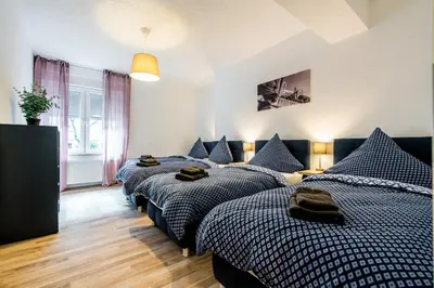 Ein Bett oder Betten in einem Zimmer der Unterkunft Comodo Apartments Solingen