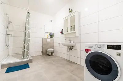 Ein Badezimmer in der Unterkunft Comodo Apartments Solingen