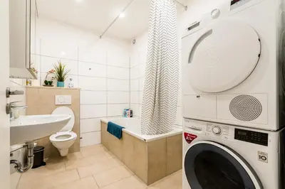 Ein Badezimmer in der Unterkunft Comodo Apartments Solingen