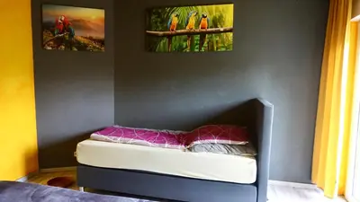 Ein Bett oder Betten in einem Zimmer der Unterkunft Joys Ferienwohnung