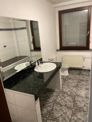 Ein Badezimmer in der Unterkunft Pension Hoffmann