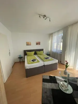Ein Bett oder Betten in einem Zimmer der Unterkunft City-Pension-Dortmund