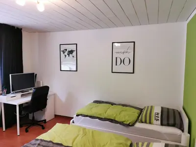 Ein Bett oder Betten in einem Zimmer der Unterkunft Ferienwohnung Sonnwald