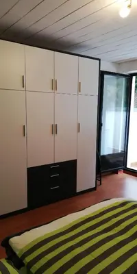 Ein Bett oder Betten in einem Zimmer der Unterkunft Ferienwohnung Sonnwald