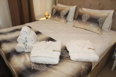 Ein Bett oder Betten in einem Zimmer der Unterkunft Kispet Deluxe Hotels&Suites