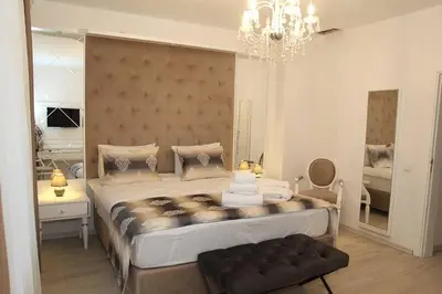 Ein Bett oder Betten in einem Zimmer der Unterkunft Kispet Deluxe Hotels&Suites