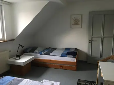 Ein Bett oder Betten in einem Zimmer der Unterkunft Zweizimmerwohnung nah der Messe