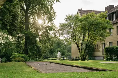 Ein Garten an der Unterkunft Gästehaus Auf dem Heiligen Berg B&B