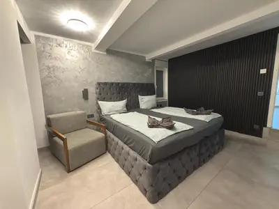 Ein Bett oder Betten in einem Zimmer der Unterkunft All In