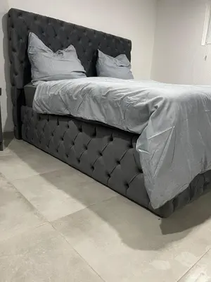 Ein Bett oder Betten in einem Zimmer der Unterkunft All In