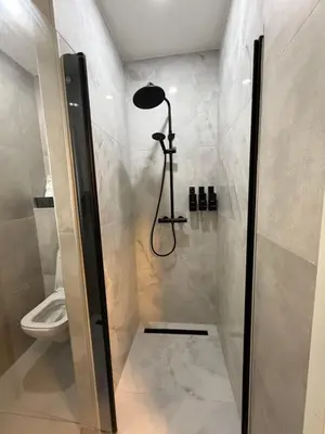 Ein Badezimmer in der Unterkunft All In