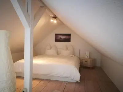 Ein Bett oder Betten in einem Zimmer der Unterkunft 45 m² Maisonette-Wohnung in Uni-/Hauptbahnhofnähe