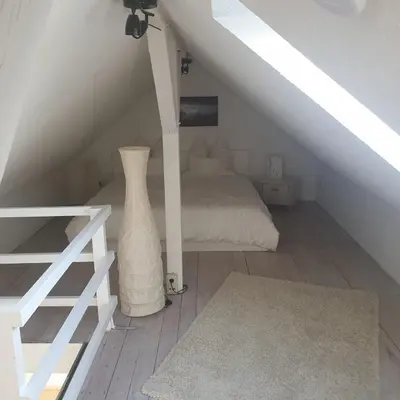 Ein Bett oder Betten in einem Zimmer der Unterkunft 45 m² Maisonette-Wohnung in Uni-/Hauptbahnhofnähe
