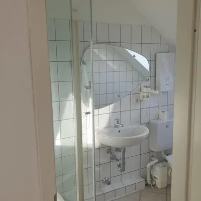 Ein Badezimmer in der Unterkunft 45 m² Maisonette-Wohnung in Uni-/Hauptbahnhofnähe