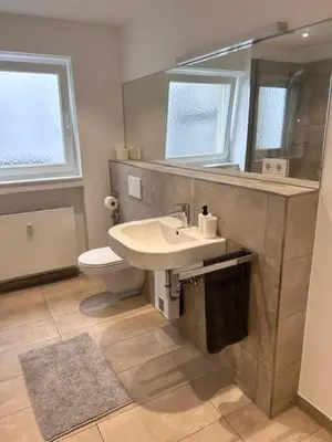 Ein Badezimmer in der Unterkunft City Center Apartments Düsseldorf