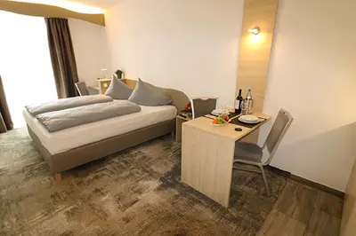 Ein Bett oder Betten in einem Zimmer der Unterkunft Petul Apart Hotel An'ne 40