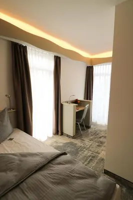 Ein Bett oder Betten in einem Zimmer der Unterkunft Petul Apart Hotel An'ne 40