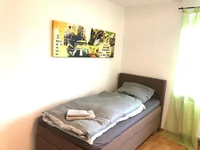 Ein Bett oder Betten in einem Zimmer der Unterkunft Paradise Apartments