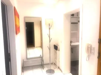 Ein Bett oder Betten in einem Zimmer der Unterkunft Paradise Apartments