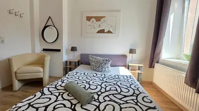 Ein Bett oder Betten in einem Zimmer der Unterkunft ELENA flat Orchidee Duisburg Zentrum