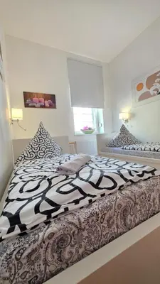 Ein Bett oder Betten in einem Zimmer der Unterkunft ELENA flat Orchidee Duisburg Zentrum
