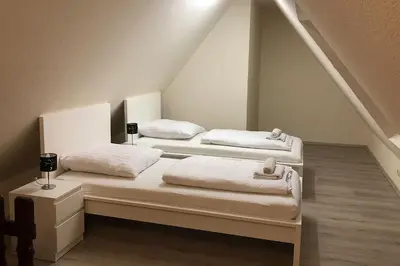 Ein Bett oder Betten in einem Zimmer der Unterkunft cosy three room apartment with flatscreen TV