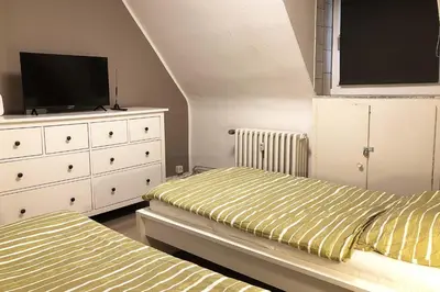 Ein Bett oder Betten in einem Zimmer der Unterkunft cosy three room apartment with flatscreen TV