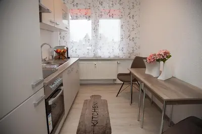 Küche/Küchenzeile in der Unterkunft T&K Apartments near Messe Fair Trade Düsseldorf und Airport 2B