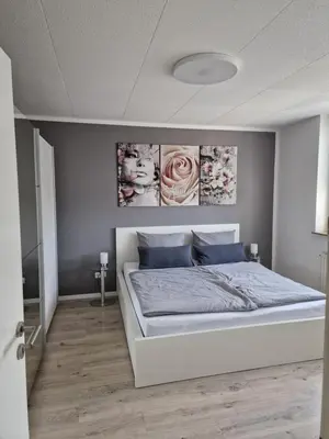 Ein Bett oder Betten in einem Zimmer der Unterkunft Ferienwohnungen Fuchs