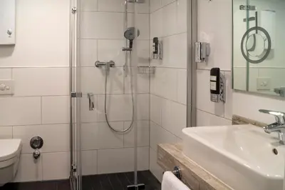 Ein Badezimmer in der Unterkunft Trip Inn Hotel & Suites Essen