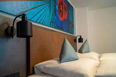 Ein Bett oder Betten in einem Zimmer der Unterkunft Trip Inn Hotel & Suites Essen