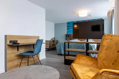 TV/Unterhaltungsangebot in der Unterkunft Trip Inn Hotel & Suites Essen