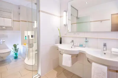 Ein Badezimmer in der Unterkunft Hotel Essener Hof; Sure Hotel Collection by Best Western