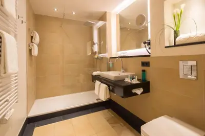 Ein Badezimmer in der Unterkunft Hotel Essener Hof; Sure Hotel Collection by Best Western