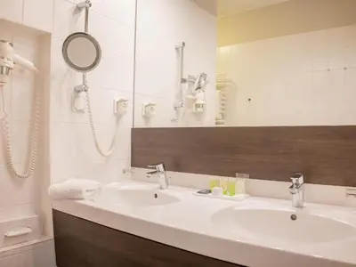 Ein Badezimmer in der Unterkunft Hotel Essener Hof; Sure Hotel Collection by Best Western