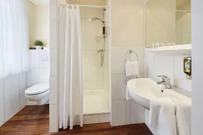 Ein Badezimmer in der Unterkunft Hotel Imperial Düsseldorf Superior - Sure Collection by Best Western
