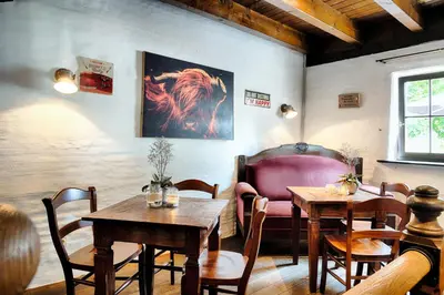 Ein Sitzbereich in der Unterkunft Welcome Hotel Wesel