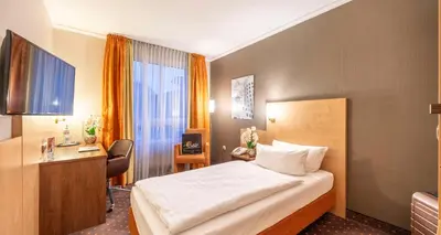 Ein Bett oder Betten in einem Zimmer der Unterkunft Sure Hotel by Best Western Hilden-Düsseldorf