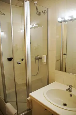Ein Badezimmer in der Unterkunft Hotel Alberga