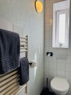 Ein Badezimmer in der Unterkunft Hotel Sittardsberg