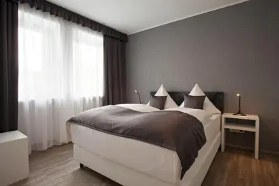 Ein Bett oder Betten in einem Zimmer der Unterkunft Hotel Asahi